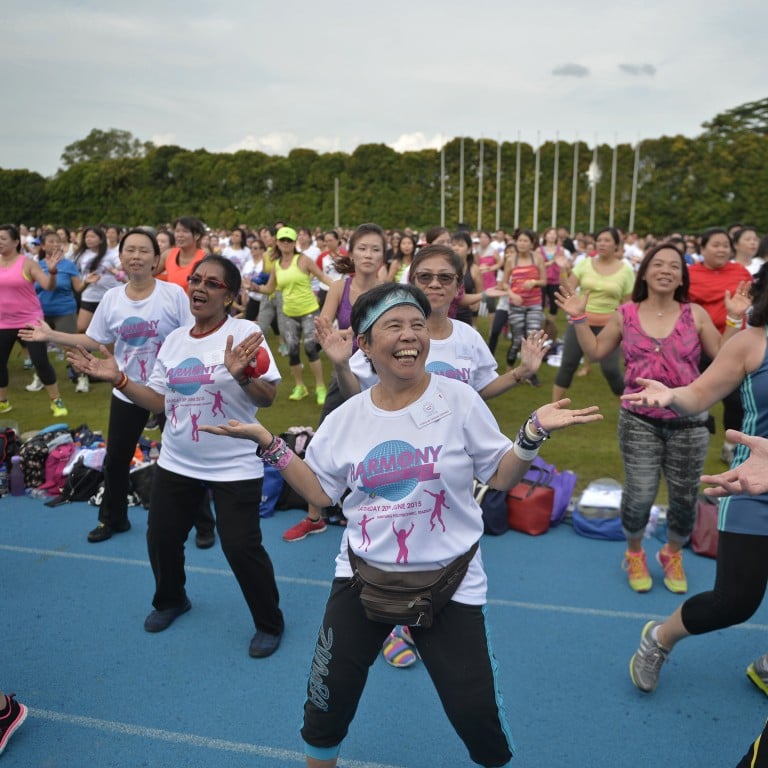 More than 3,500 set a record for the largest zumba dance in Singapore on June 20, 2015, part of efforts by the Thye Hua Kwan Moral Society to promote interracial and interreligious harmony. Singapore is an example of an Asian state with successful strategies to address multi-ethnic stresses and forge dynamic and stable multicultural communities. Photo: SPH
